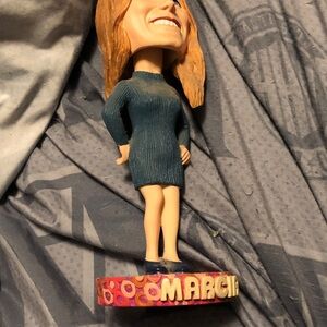 Blue Bobblehead Figurine